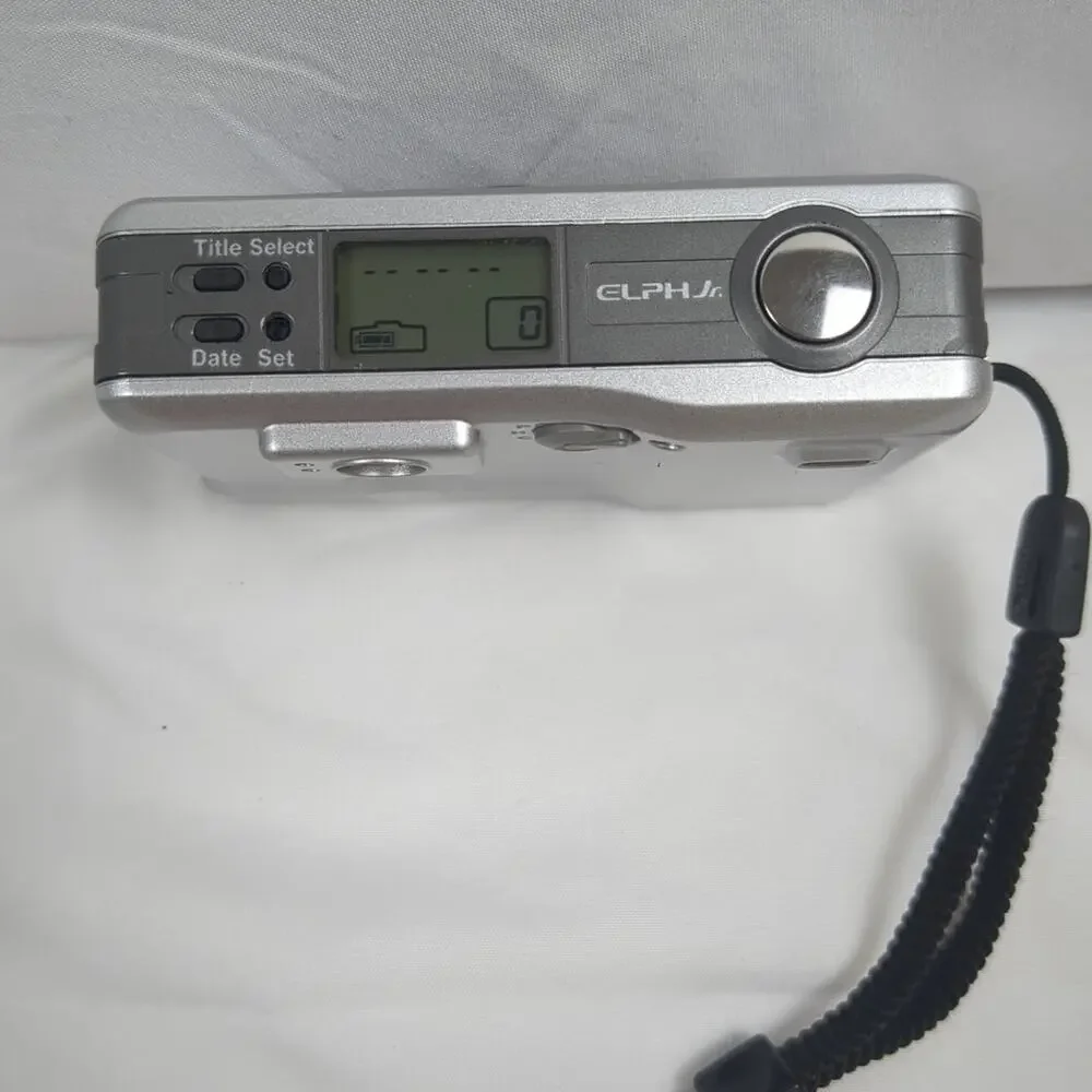 Canon IX240 Camera Elph Jr. Film Point & Shoot 26mm‎ 1:2.8 Silver Used